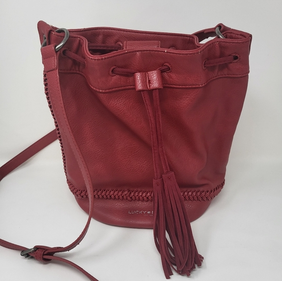 Lucky Brand Handbags - Lucky Brand Crossbody Bucket Bag Tassel Braided Red Faux Leather